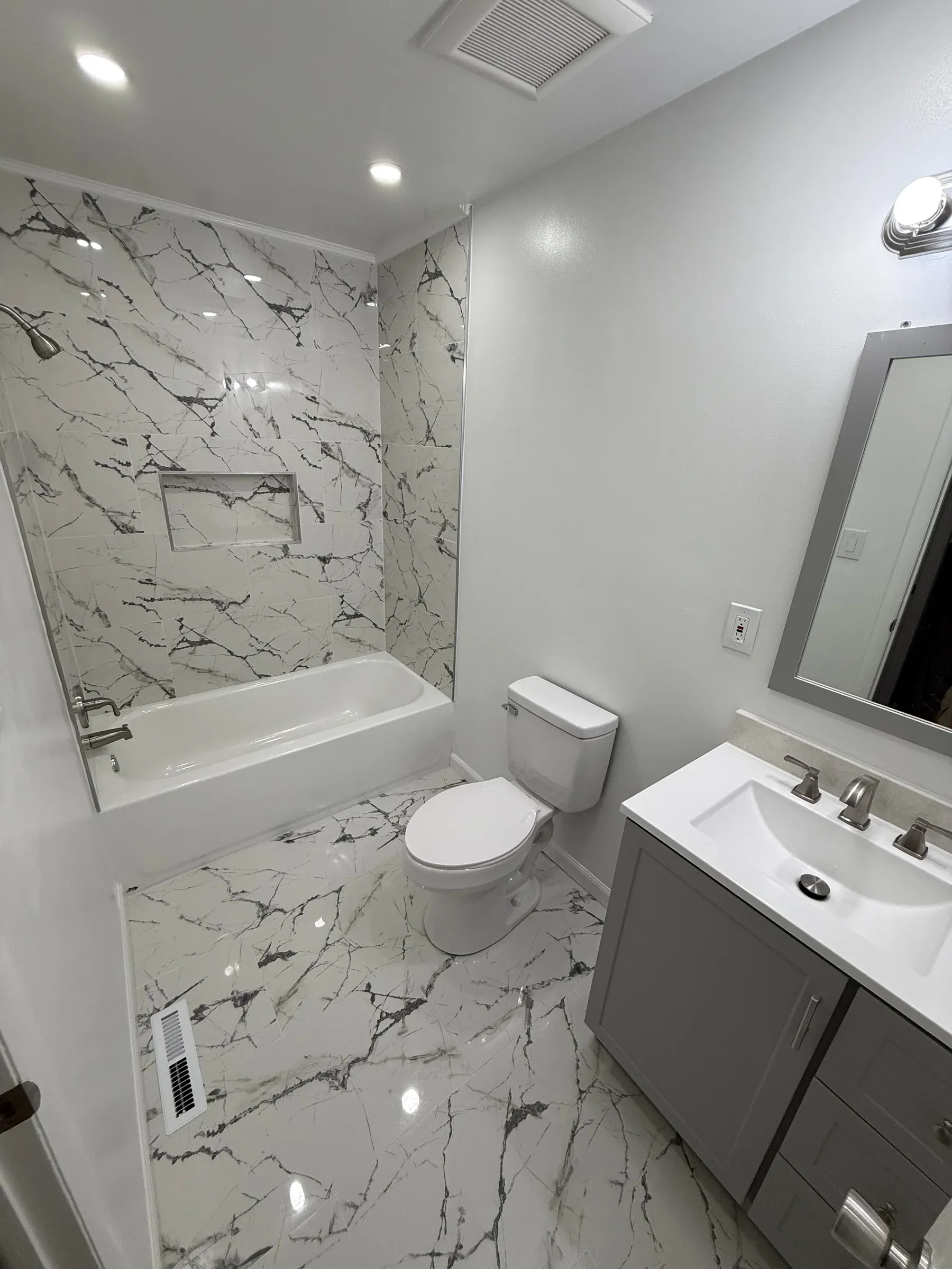 Custom tile bathroom by Zavala & Sons