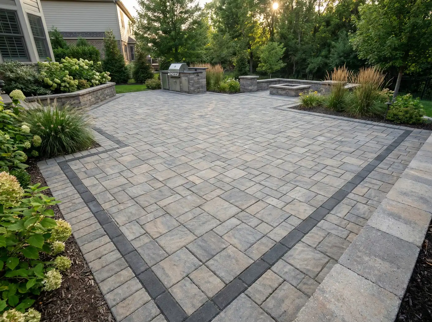 Concept rendering: large paver patio with a built-in grill station, seat wall and hydrangea beds in Wilmington, DE
